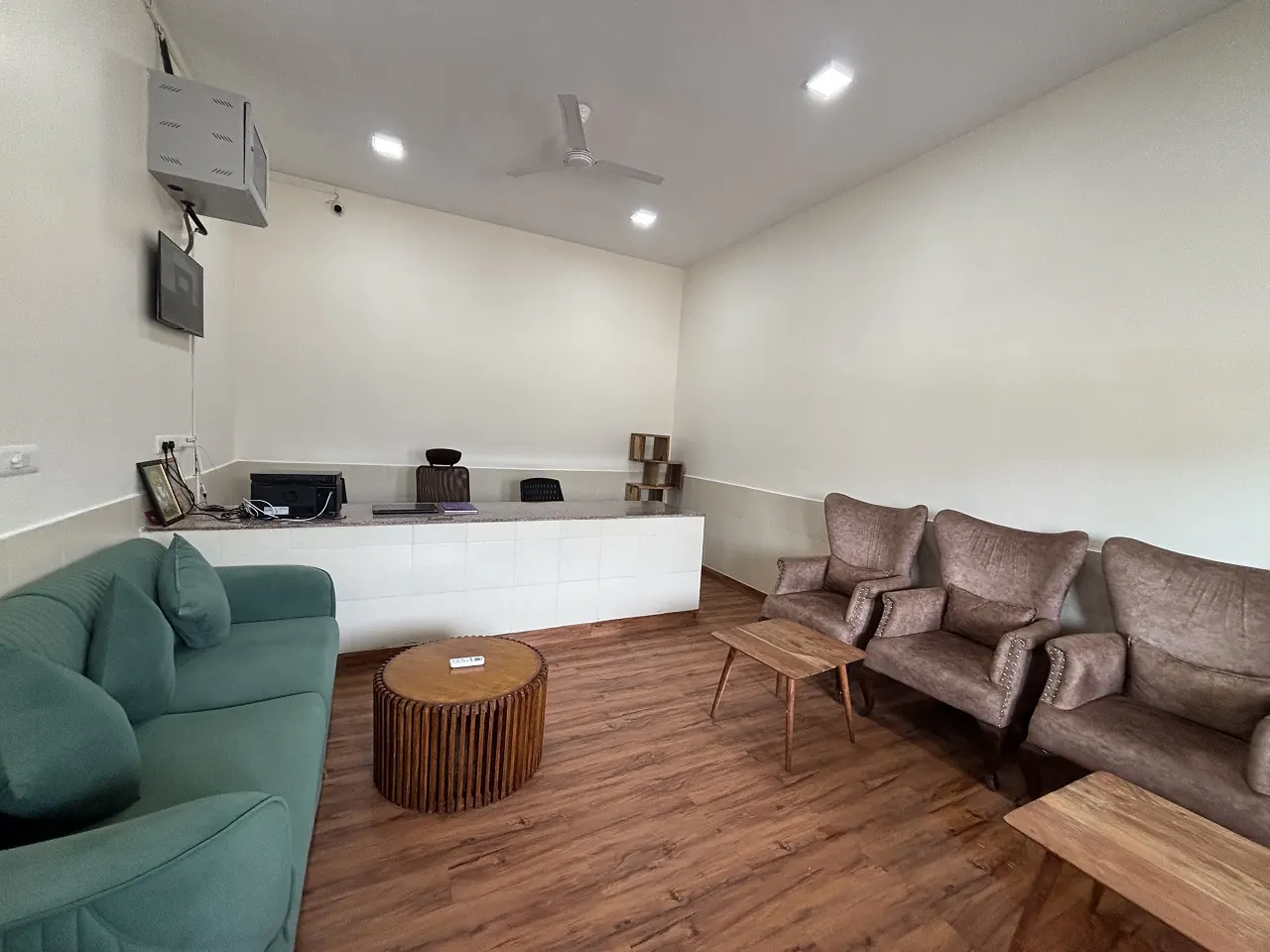Reception lounge with sofas at Guru Kripa Hotel, Agolai